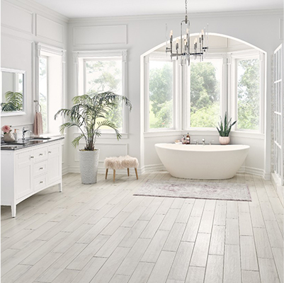 bathroom with luxury vinyl plank flooring